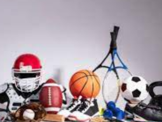Image of multiple pieces of sports equipment including helmets and balls
